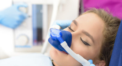 Anesthesia being used on young woman before dental work